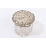 George IV cut glass dressing table pot with fine quality silver gilt slip-on cover with cast floral