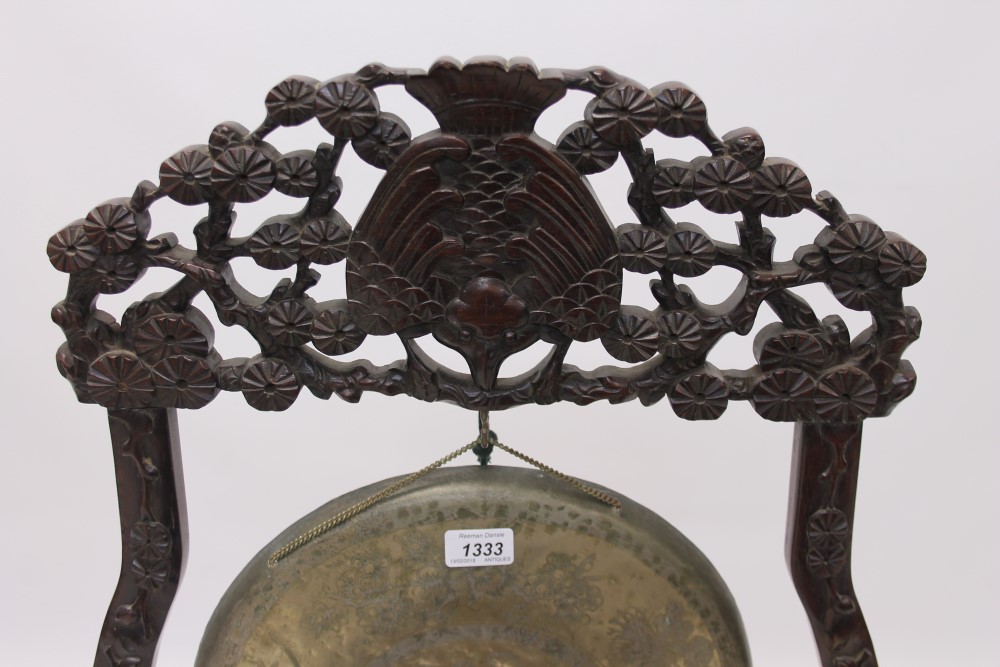 Late 19th / early 20th century Chinese carved hardwood gong stand with tooled metal gong and beater, - Image 2 of 12