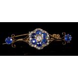 Late Victorian diamond and sapphire bar brooch with a central flower-head cluster - comprising a