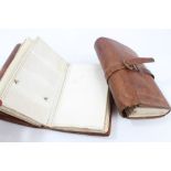 Pair of Edwardian leather covered fishing fly wallets with vellum pockets,