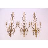 Set of three rococo-style wall appliqués,