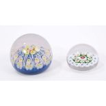 Two 19th century glass paperweights with coloured canes in floral design,