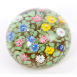 19th century glass paperweight with standing flowers on green leaf ground, 9.