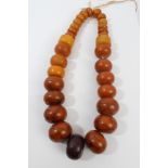 Old amber bead necklace with a string of thirty large graduated amber beads,