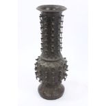 19th century Chinese bronze vase of high-necked baluster form,