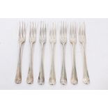 Seven Victorian Scottish silver Hanoverian pattern three-pronged dessert forks with engraved crests