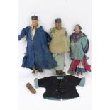 Three late 19th century Chinese dolls with realistic carved wooden and plaster heads,