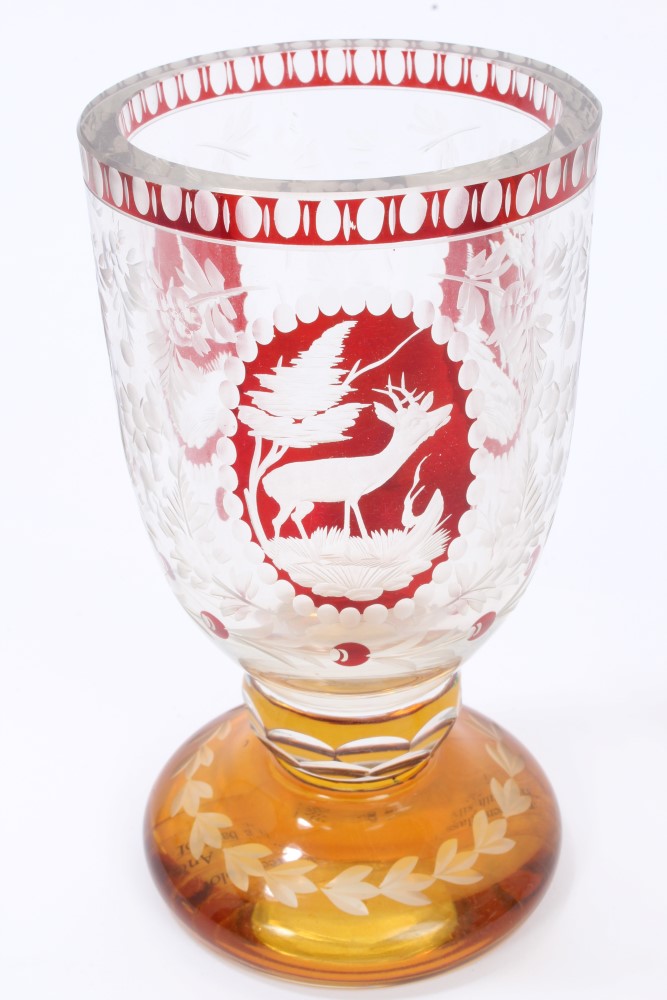 Three 19th century Bohemian ruby and amber overlaid glass vases with engraved building and animal - Image 3 of 6