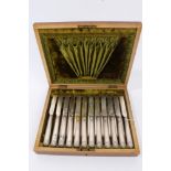 Set of twelve pairs Victorian fruit knives and forks with silver blades and silver shell and thread