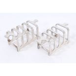 Pair 1930s white metal four-division toast racks of small proportions,