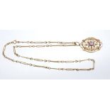 Edwardian gold amethyst and seed pearl pendant of openwork design,