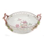 18th century, probably Chelsea, basket dish with twin branch floral encrusted handles,