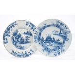 Two 18th century English Delft blue and white plates painted with Chinese river landscapes,