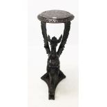 Unusual 19th century carved walnut Baronial revival pedestal with circular incised top raised on