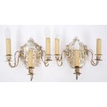 Pair late 19th / early 20th century silver plated wall sconces of shaped oval form,