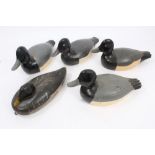 An old carved and painted wooden mallard decoy duck and four others similar (5)