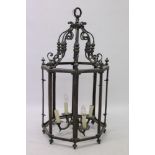 Large octagonal brass four-light lantern of typical form,