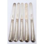 Five Victorian silver-handled and bladed dessert knives with engraved crests (Sheffield 1859 / 60),