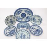 Collection of 18th century Chinese export blue and white dinnerware - comprising two ashets,