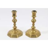 Pair early 18th century brass candlesticks with knopped stems and octagonal bases,