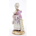 Late 19th century Meissen porcelain figure of a lady reading,