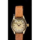 1940s Rolex Chronometer gold wristwatch with circular dial, applied gold numerals and minute track,