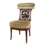 Extremely rare mid-Victorian rosewood smokers chair - the cushion upholstered top rail hinged to