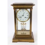 Late 19th century four-glass mantel clock with French eight day movement striking on a bell,