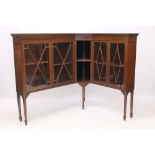 Rare pair of Edwardian mahogany low corner bookcases,