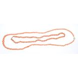 Two old coral bead necklaces - one with graduated beads, 7.6mm to 3.
