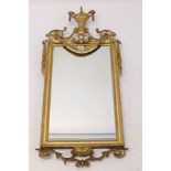 19th century classical revival wall mirror with rectangular plate in moulded frame with urn and