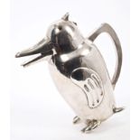 Unusual 1920s / 1930s Chinese white metal decanter in the form of a stylised penguin with black