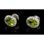 Pair peridot and diamond oval cluster earrings,
