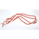 Coral bead and cultured pearl three-strand necklace with cross pendant on matching gold (9ct) clasp