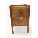 George III mahogany bedside cupboard with pierced gallery and enclosed cupboard with console drawer