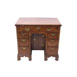 Highly unusual George II walnut crossbanded and line-inlaid estate desk with hinged fold-over