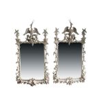 Pair of Chippendale-style cream painted ornate wall mirrors,