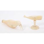Antique Inuit marine ivory carving of a walrus, 12cm long, together with another of a whale,