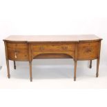 Very large George III mahogany and walnut crossbanded bowed breakfront sideboard centred by two