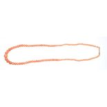 Coral bead necklace with a string of graduated pink coral beads measuring approximately 8.8mm to 3.