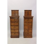 Pair of narrow Victorian figured walnut chests,