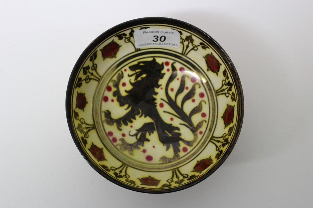 Pilkingtons Royal Lancastrian red lustre bowl decorated with rampant lion and floral and foliate