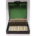 Mirolti piano accordion with faux mother of pearl decoration,