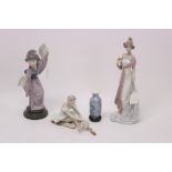 Three Lladro figures - comprising elegant lady with flower, 33cm high,