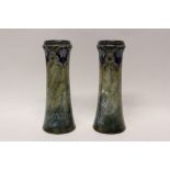 Pair of Royal Doulton blue and green glazed stoneware vases with beaded and floral decoration -