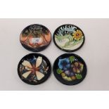 Four Moorcroft Collectors Club circular pin dishes - Panache 2004, Triple Choice 2005,