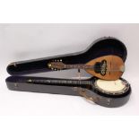 Early 20th century five-string zither banjo with enclosed head,