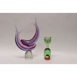 Art glass ornament of two blue and purple tinted fish and a green and amber art glass cat (2)