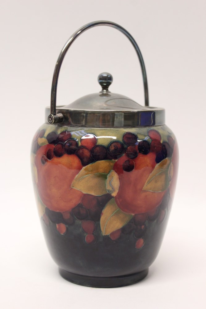 Moorcroft pottery biscuit barrel decorated in the Pomegranate pattern,