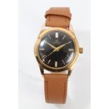 Gentlemen's Bucherer wristwatch with circular black dial with applied gold baton hour markers in